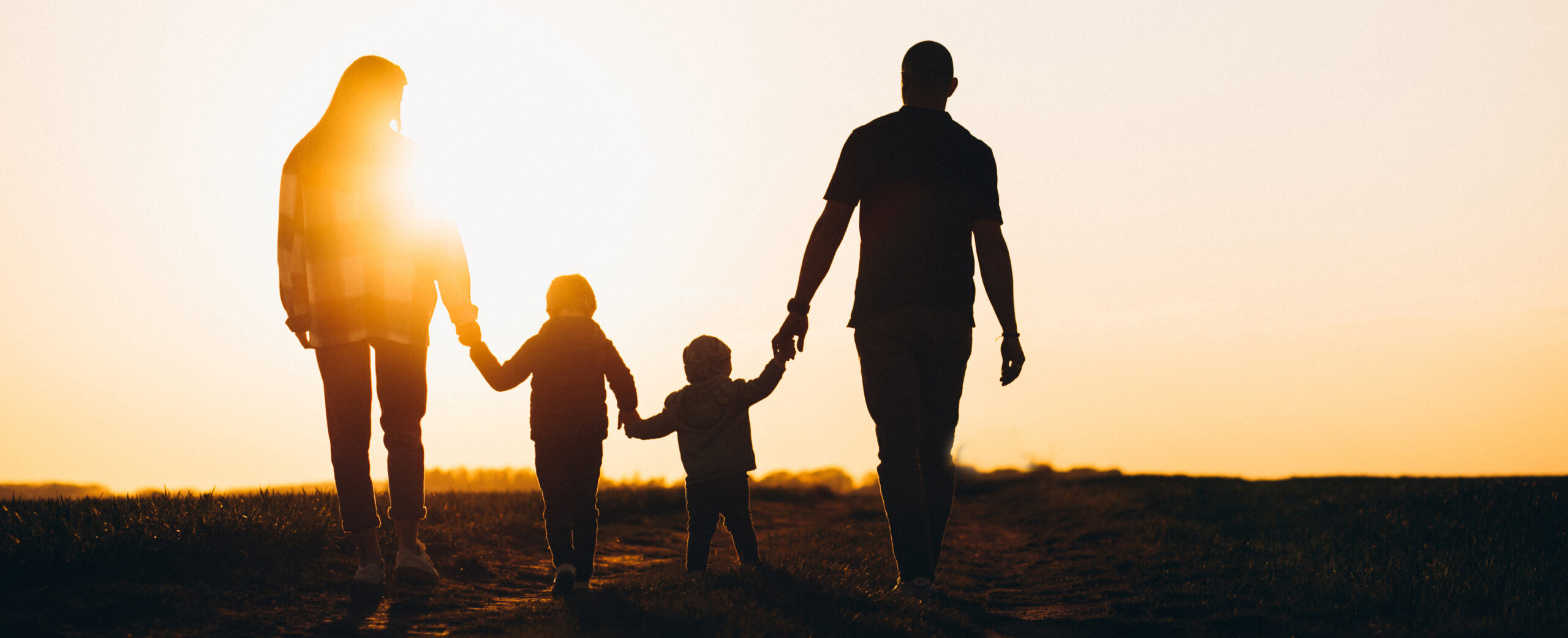 Silhouette of family of four